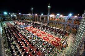 People are reciting the Qur'an in a Ramadan night in the yard of the holy shrine of Imamzadi Muhammad Hilal b. 'Ali in Aran wa Bidgol, a small city in Isfahan province, Iran. The photo is taken by Sayed Ruhollah Moosavi on June 23, 2015. (Featured in June 28, 2015)